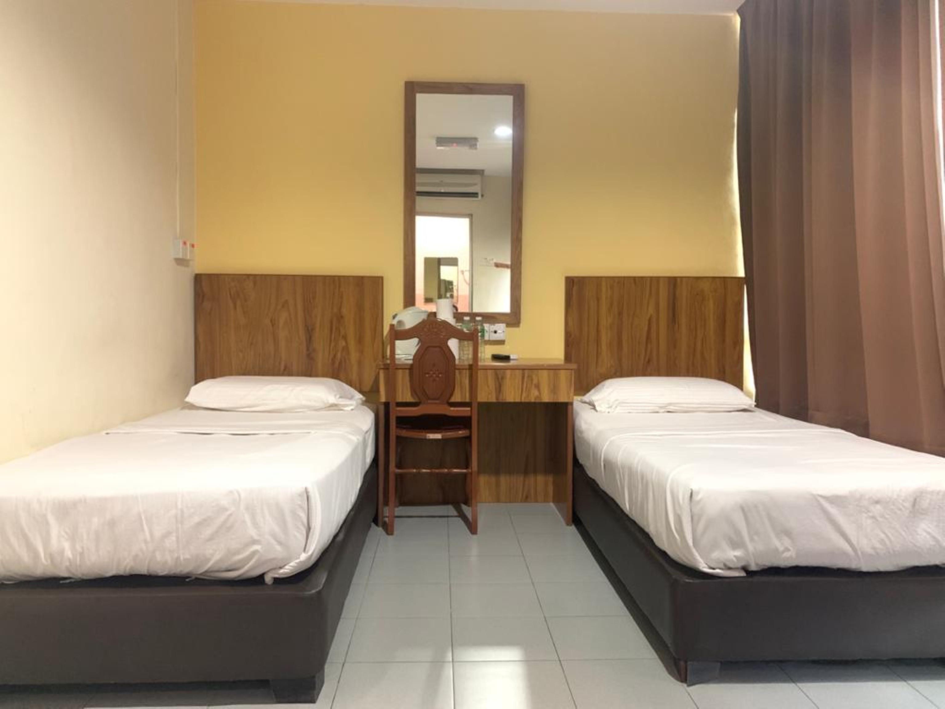 Oyo 89877 Sun Triang Hotel Kampong Kerayong Екстериор снимка