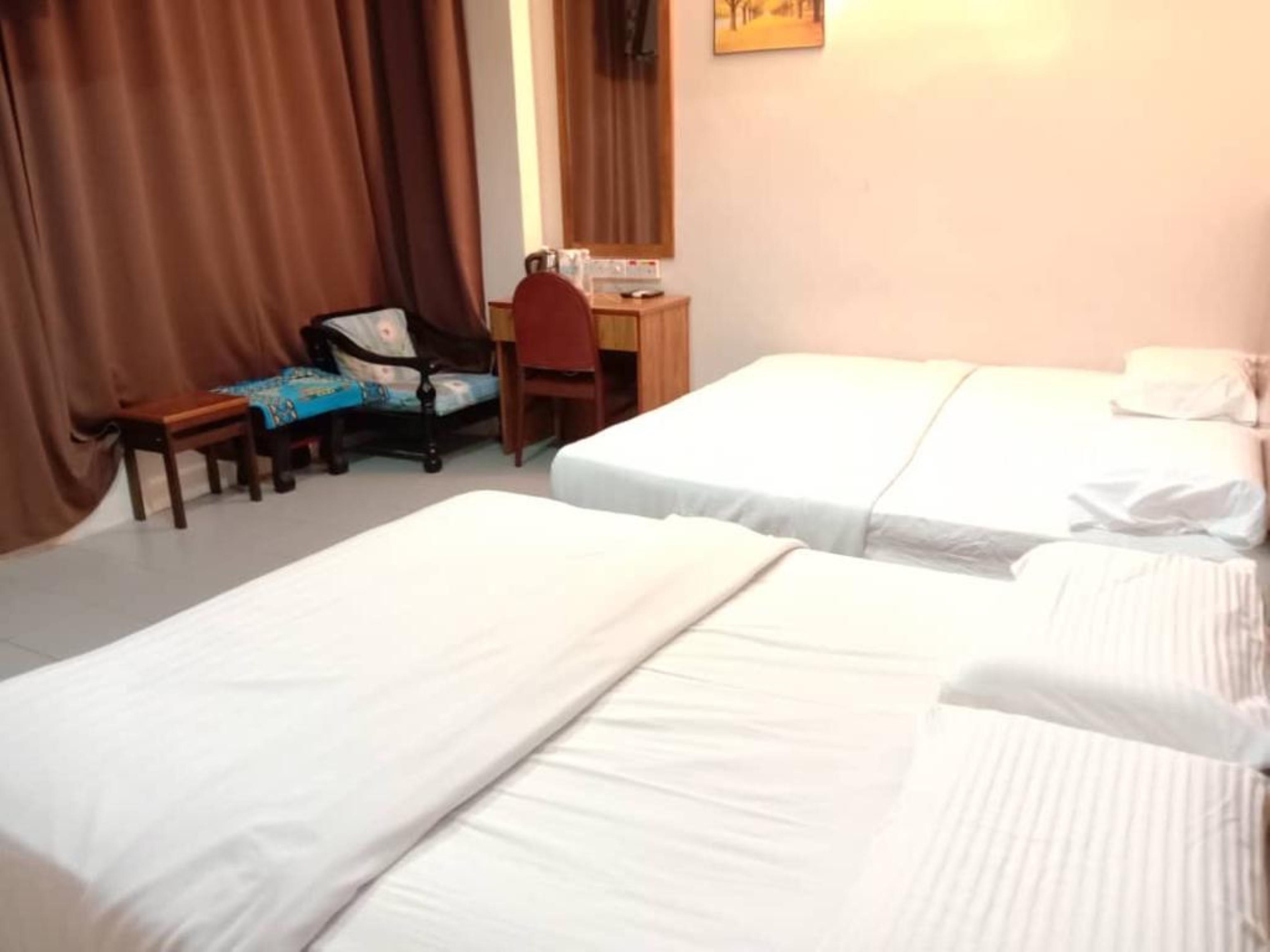 Oyo 89877 Sun Triang Hotel Kampong Kerayong Екстериор снимка