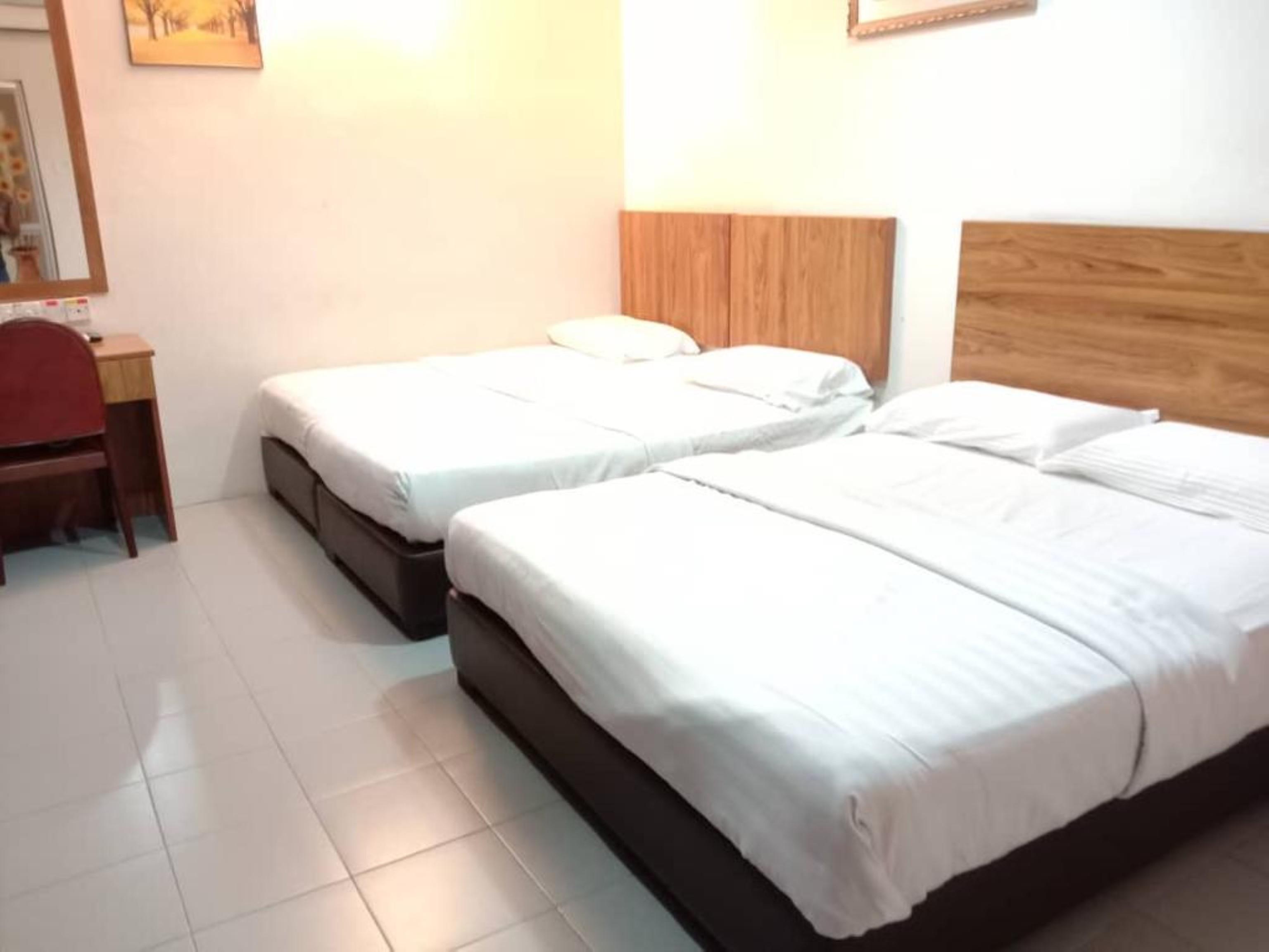 Oyo 89877 Sun Triang Hotel Kampong Kerayong Екстериор снимка