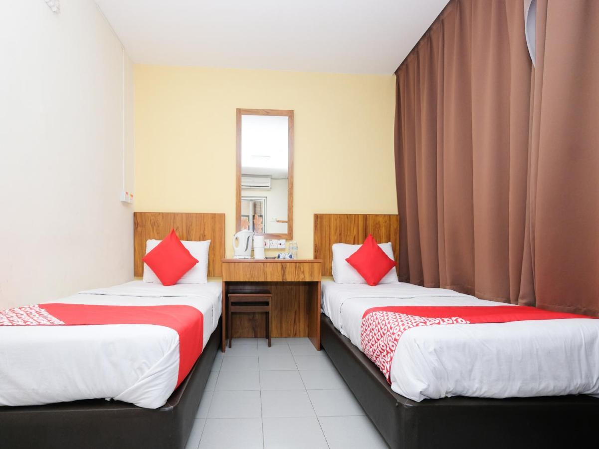 Oyo 89877 Sun Triang Hotel Kampong Kerayong Екстериор снимка
