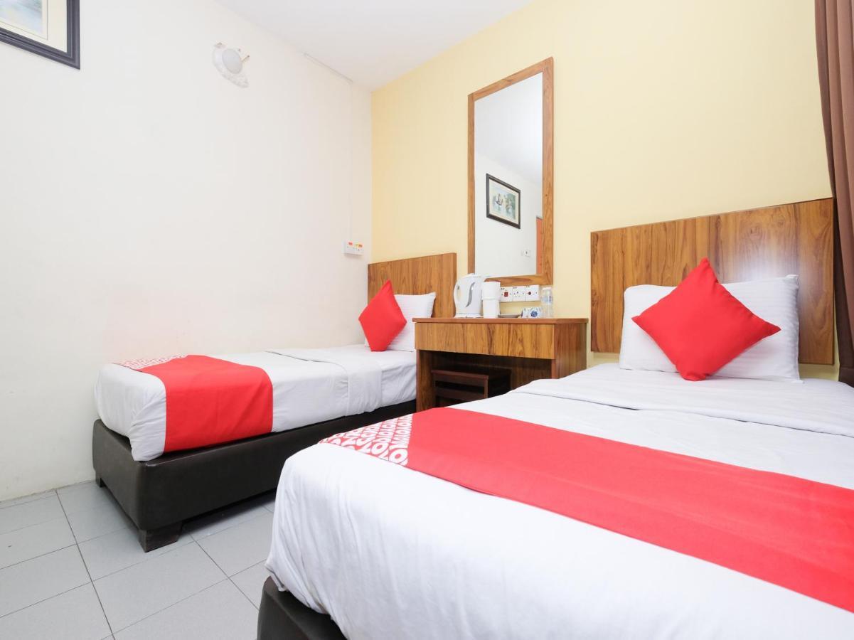 Oyo 89877 Sun Triang Hotel Kampong Kerayong Екстериор снимка