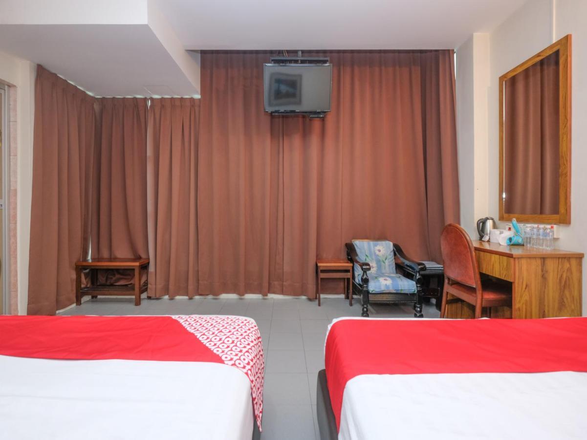 Oyo 89877 Sun Triang Hotel Kampong Kerayong Екстериор снимка